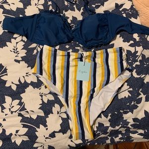 High waisted swim suit. Size M top and L bottom.